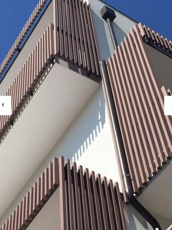 Aluminium louver vs ACP cladding building exterior | WoodenMax