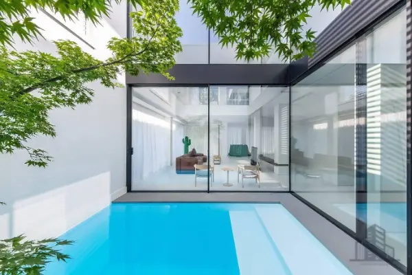 Slimline aluminium window with slim profile casement and glass pergola — WoodenMax